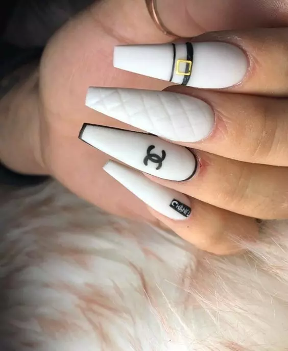 White Acrylic Nails With Some Art