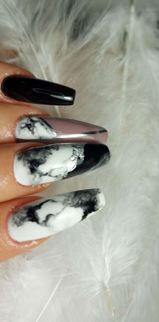 Black, white, and purple marble coffin nails.