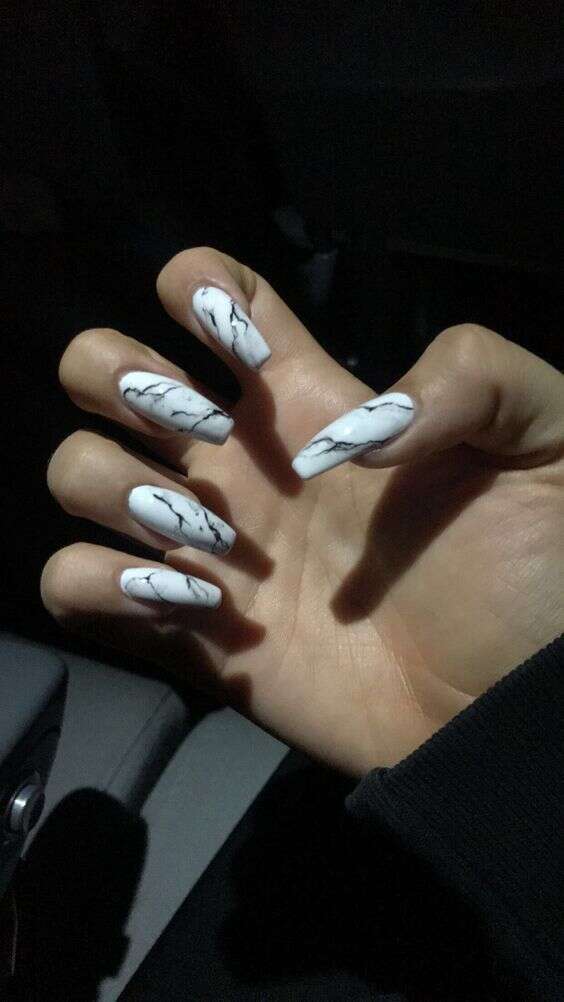Black In White Glossy Marble Nail Design